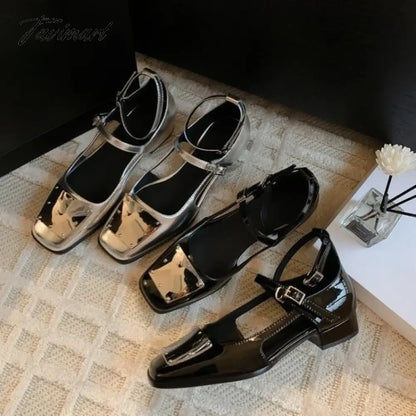 Hollow out silver Mary Jane shoes with square toe, thick heels, shallow cut, one line buckle, single shoe